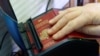 UKRAINE – Scanning a Russian passport for border control at the Ukrainian border