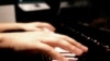Azerbaijan - Hands on piano. İllistrative photo